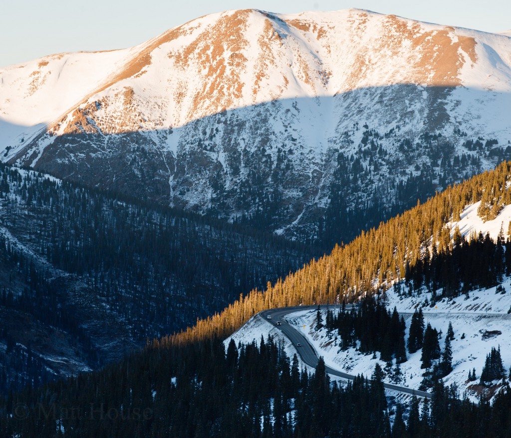 Cars going down Route 6 away from Loveland Pass toward I-70