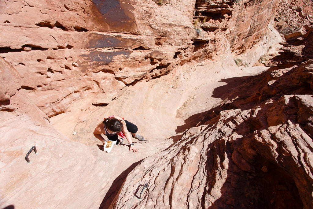 Ariel climbing with sandwiches
